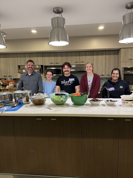 Slate staff volunteering for the Meals that Heal program at the Ronald McDonald House 